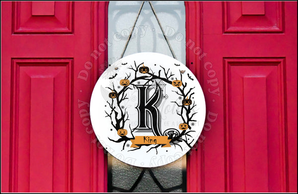 Monogram Halloween door hanger.
