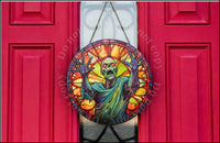 Stained glass mummy door hanger.