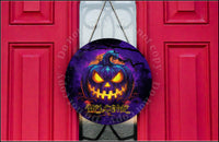 Scary Jack-o'-lantern door hanger.