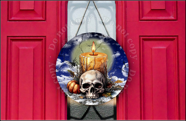Candle and skull door hanger.